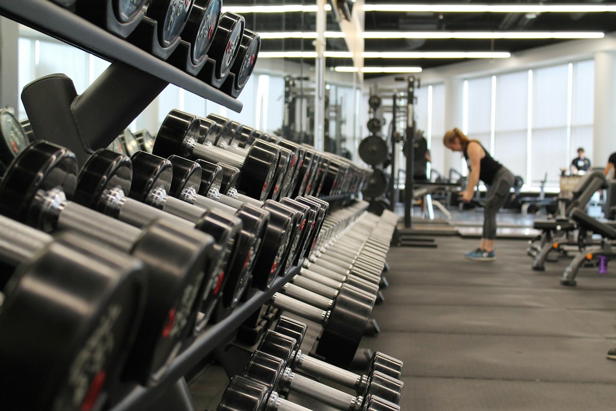 Illustrative gym concept showing free weights concept - not actual gym equipment